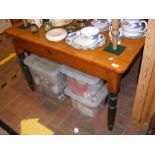 A pine kitchen table - length 117cm