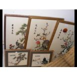 Three Oriental silk work pictures of birds and flo