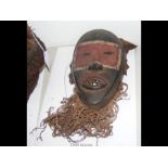An old African Dan mask - 21cms long