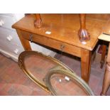 A 20th century oak desk with two drawers