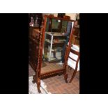 An attractive 19th century Cheval mirror on barley