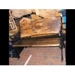 A rustic wrought iron and wooden garden bench