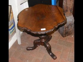 A 19th century shaped wine table