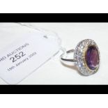 A large amethyst and diamond ring in 18ct white go