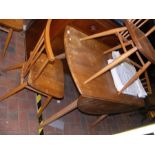 An Ercol table and four chairs for restoration