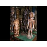 A 50cm high old carved African tribal figure of se