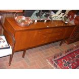 A White & Newton Ltd retro teak sideboard with thr