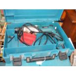 A Makita Power Drill in case, together with Makita