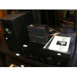 A Pioneer A-10 integrated amplifier together with Bose Acoustimass 5 sound system