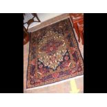 A small Middle Eastern rug - 145cm x 105cm