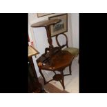 An antique occasional table together with a tripod