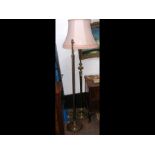 An antique adjustable brass standard lamp and one