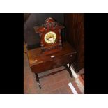 A wooden cased mantle clock together with a small