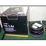 A boxed Nikon Teleconverter