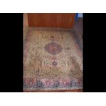 A large Middle Eastern style carpet with geometric