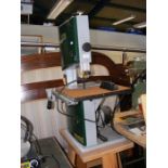 A Record Power BS10 10 inch band saw on wheeled wo