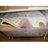A box containing collectable stamps, unused sheets