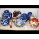 A cluster of oriental ginger jars, vases and bowls