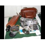A vintage Voigtlander SLR Camera with carrying cas