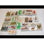 A box containing cigarette cards (approx. 30 packs