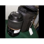 A Tamron 90mm Macro Lens with case