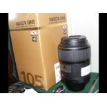 A boxed Nikon 105mm AF-S Micro Lens