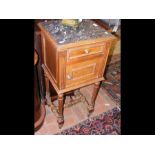 An antique marble top French pot cupboard