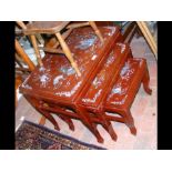 A nest of three inlaid Oriental occasional tables