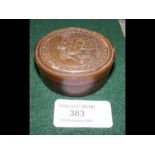 A carved antique horn circular pill box - 6cm diam