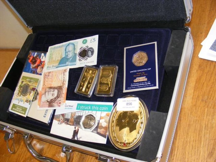 A selection of collectable commemorative coins, in