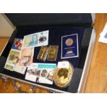 A selection of collectable commemorative coins, in