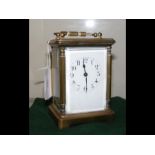 A 12cm high brass carriage clock