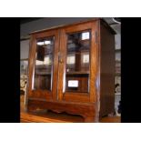 An oak smoker's cabinet (key included) - width 34c