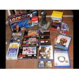 An assortment of vintage video games and accessori