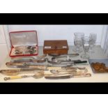 An assortment of silver plated cutlery, presentati