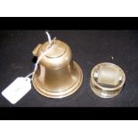 A silver inkwell in the form of a bell, together w