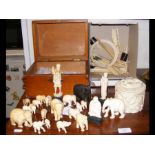 Small carved ivory elephants, buddha etc