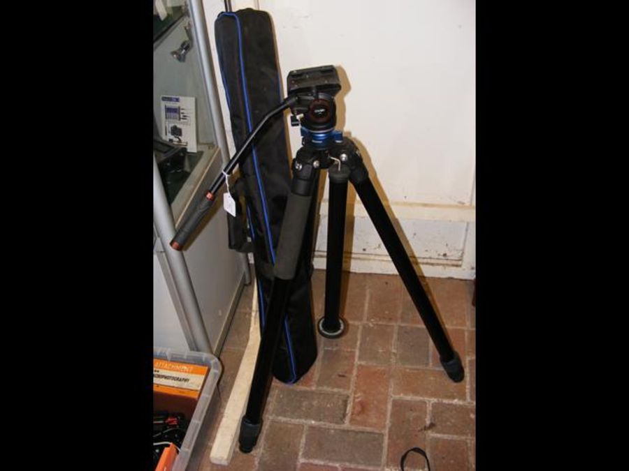 A good quality adjustable camera tripod with carry