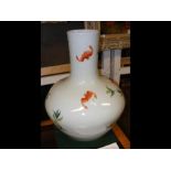 A large Chinese vase painted with peaches and gree