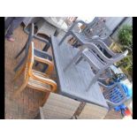 A painted teak garden table and six chairs