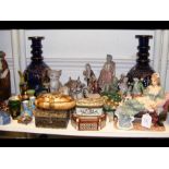 An assortment of collectables, including china fig