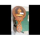 A late 19th century Sorrento olive wood and marquetry fret-pierced hand mirror