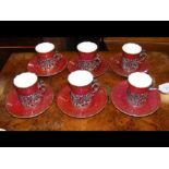 A set of six Coalport coffee cans and saucers with