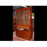 A Victorian mahogany secretaire bookcase with cupb