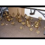 Four brass chandeliers