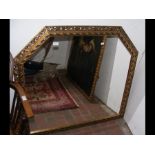 A modern gilt framed wall mirror