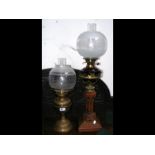 A decorative oil lamp and one other