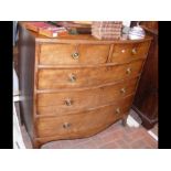 A 19th century mahogany bow front chest of two sho