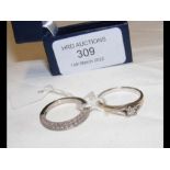 A diamond solitaire ring and one other in gold set