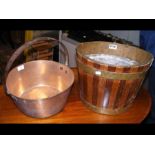 An oval wooden and metal bound bucket together wit